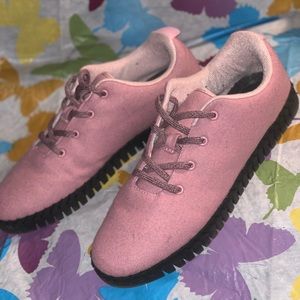 Pink athletic sneakers, great for walking and work.